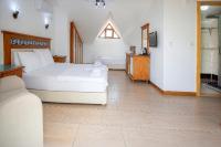 Postel nebo postele na pokoji v ubytování Datca Kilic Hotel