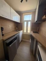 Kuchyň nebo kuchyňský kout v ubytování Chernomorets Apartment