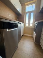 Kuchyň nebo kuchyňský kout v ubytování Chernomorets Apartment