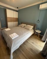Postel nebo postele na pokoji v ubytování Chernomorets Apartment