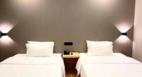 7 Days Inn Fucheng Wu Gongci Gaodeng East Street Binjiang Roadにあるベッド