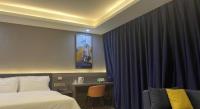 7 Days Inn Fucheng Wu Gongci Gaodeng East Street Binjiang Roadにあるベッド