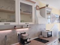 Kuchyň nebo kuchyňský kout v ubytování Apartment White dolphin GreeenLife