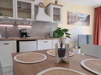 Kuchyň nebo kuchyňský kout v ubytování Apartment White dolphin GreeenLife