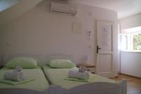 Postel nebo postele na pokoji v ubytování Studio Apartments & Rooms Lela, Sipan island