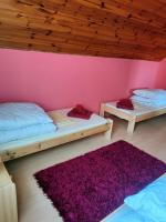 Postel nebo postele na pokoji v ubytování Apartmán v Záchranné stanici Pasíčka