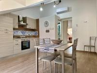 A kitchen or kitchenette at Alba & Tramonto