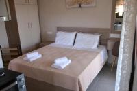 A bed or beds in a room at House Christina