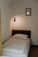 Łóżko lub łóżka w pokoju w obiekcie Appartement Zentrum