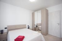 A bed or beds in a room at Casa Michela