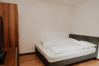 Łóżko lub łóżka w pokoju w obiekcie Appartement Zentrum