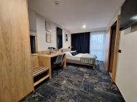 Posteľ alebo postele v izbe v ubytovaní Hotel Gromada Łomża