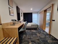 Posteľ alebo postele v izbe v ubytovaní Hotel Gromada Łomża