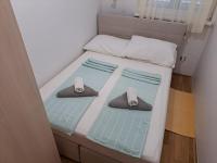 Postel nebo postele na pokoji v ubytování Apartment Adriana