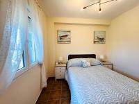 Posteľ alebo postele v izbe v ubytovaní Marina Isla Canela apartment
