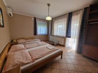 Posteľ alebo postele v izbe v ubytovaní Villa Letícia Siófok
