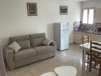 Kuchnia lub aneks kuchenny w obiekcie Appartement avec extérieur et parking gratuit