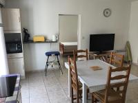 Kuchnia lub aneks kuchenny w obiekcie Appartement avec extérieur et parking gratuit