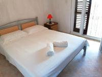 Posteľ alebo postele v izbe v ubytovaní Apartmani Lukin