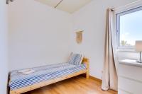 Postel nebo postele na pokoji v ubytování Casa Ramiro T2 Paradisíaco entre o Mar e a Ria