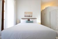 Posteľ alebo postele v izbe v ubytovaní Sophia Areopoli Guesthouse