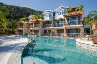 The swimming pool at or close to La Boutique Maya