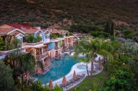 The swimming pool at or close to La Boutique Maya