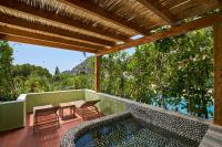 The swimming pool at or close to La Boutique Maya