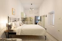 Posteľ alebo postele v izbe v ubytovaní Sophia Areopoli Guesthouse