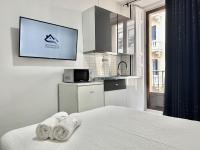 A kitchen or kitchenette at Apartamentos Day Madrid CHUECA Centro Gran Via Sol Malasaña