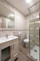 A bathroom at Apartamentos Day Madrid CHUECA Centro Gran Via Sol Malasaña