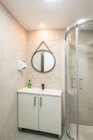 A bathroom at Apartamentos Day Madrid CHUECA Centro Gran Via Sol Malasaña