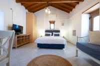 Posteľ alebo postele v izbe v ubytovaní Sophia Areopoli Guesthouse