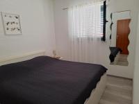 Postel nebo postele na pokoji v ubytování Apartments Marija