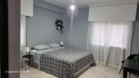 Postel nebo postele na pokoji v ubytování Beach apartment's