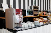 A kitchen or kitchenette at Hotel Ciudad Cangas de Onis