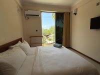 Postel nebo postele na pokoji v ubytování Noah Private Beach House