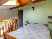 Łóżko lub łóżka w pokoju w obiekcie Maison T2 avec Mezzanine, Terrasse et Parking à 300m de la Plage - Biscarrosse - FR-1-521-214