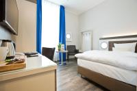 Postel nebo postele na pokoji v ubytování Best Western Plus Theodor Storm Hotel