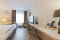 Postel nebo postele na pokoji v ubytování Best Western Plus Theodor Storm Hotel