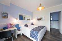 A bed or beds in a room at Locanda Fassa