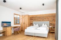 Posteľ alebo postele v izbe v ubytovaní MAYER - Wirtshaus und Dorfhotel