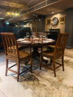 a dining room table with wine glasses on it at Bushmills Townhouse in Bushmills