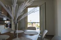 A kitchen or kitchenette at Casa Vacanze Robinson