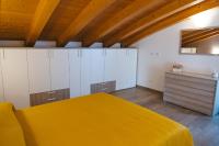 A bed or beds in a room at Casa Vacanze Robinson