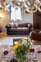 A seating area at L'Oliveta 6, Emma Villas