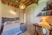 A bed or beds in a room at L'Oliveta 6, Emma Villas