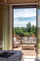 A seating area at L'Oliveta 6, Emma Villas
