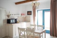 Kuchyň nebo kuchyňský kout v ubytování Mikulov Apartmány MAGISTR