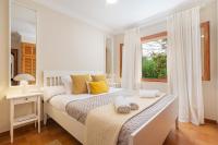 Posteľ alebo postele v izbe v ubytovaní Villa Teix de Bonaire para 10, jardines y vista mar